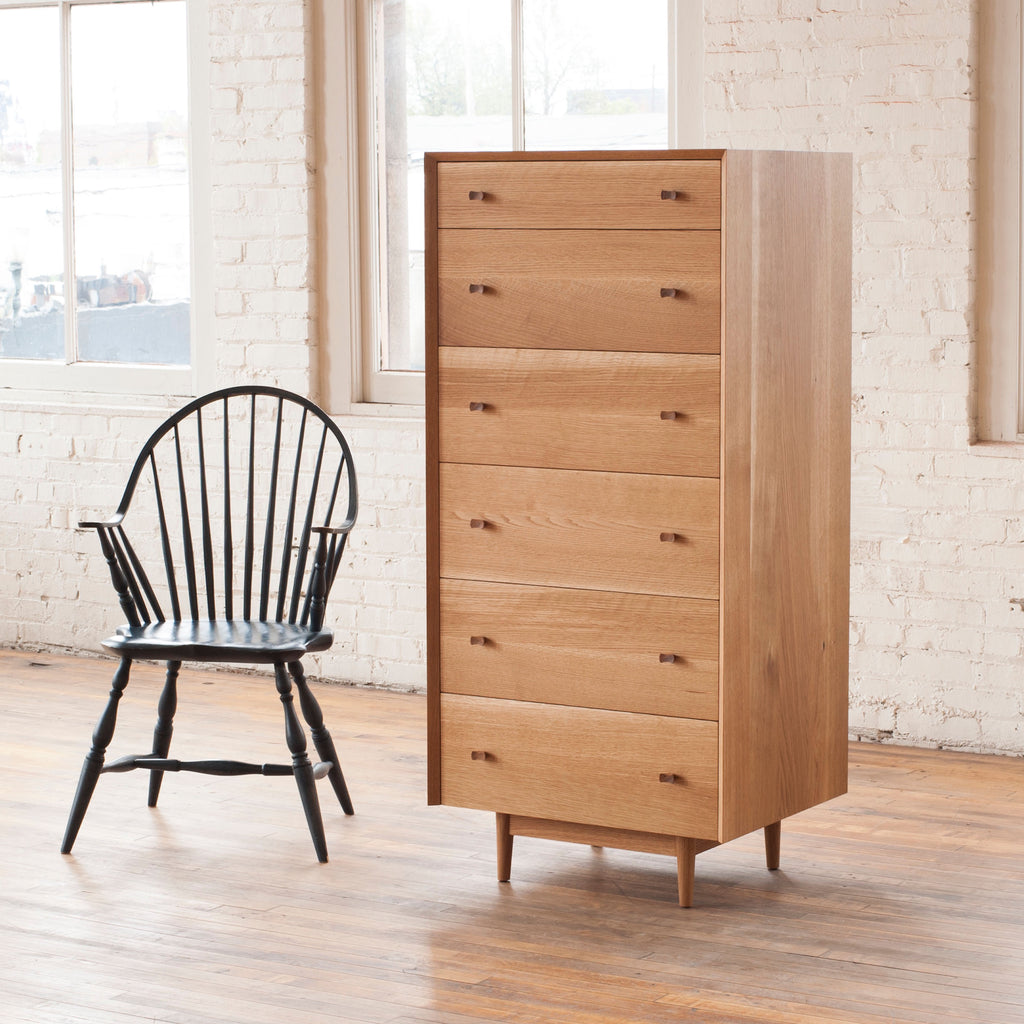 high boy dresser Phloem Studio Leo highboy solid white oak tall chest of drawers. The  hardwood case has a grain matched waterfall miter from side to top to side.  6 solid maple wood drawers slide