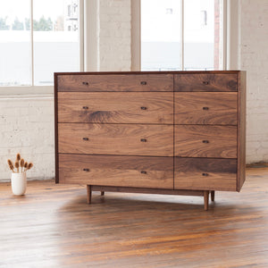 Phloem Studio Dorothy Bureau solid walnut wood chest of drawers. The hardwood case has a grain matched waterfall miter from side to top to side. The drawer fronts are grain matched. 8 Phloem Studio Dorothy Bureau solid walnut wood chest of drawers. The hardwood case has a grain matched waterfall miter from side to top to side. The drawer fronts are grain matched. 8